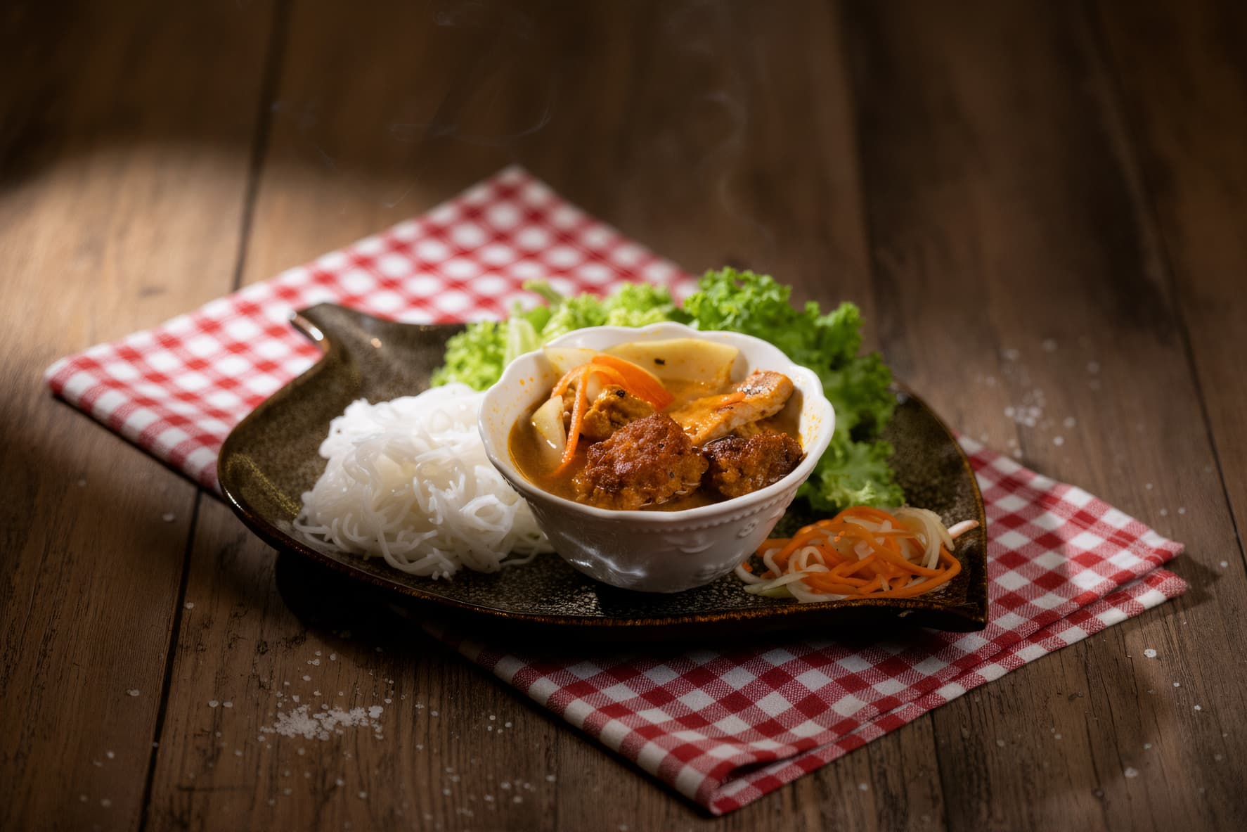 Char-grilled pork with rice noodles and fresh herbs